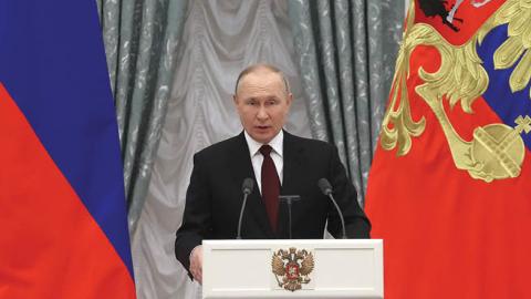 Russia's President Vladimir Putin speaks during a ceremony to present the highest state decorations at Moscow's Kremlin. (Photo by Sergei Karpukhin\TASS via Getty Images)
