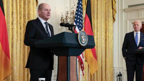 German Chancellor Olaf Scholz (L) delivers remarks alongside U.S. President Joe Biden during a joint news conference in the East Room of the White House on February 07, 2022, in Washington, DC. (Getty Images)