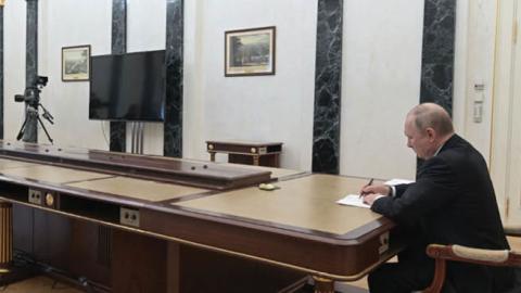 Russian President Vladimir Putin meets with Defence Minister Sergei Shoigu and chief of the general staff Valery Gerasimov in Moscow on February 27, 2022. (Photo by Alexey Nikolsky/Sputnik/AFP via Getty Images)