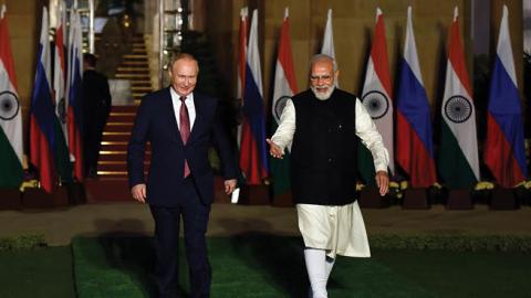 Prime Minister Narendra Modi with Russian President Vladimir Putin prior to their delegation meeting at Hyderabad House, on December 6, 2021 in New Delhi, India. (Photo by Sanjeev Verma/Hindustan Times)