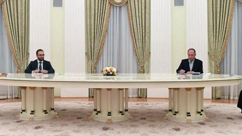 Russian President Vladimir Putin speaks with Iranian President Ebrahim Raisi during their meeting in Moscow on January 19, 2022. (Photo by Pavel Bednyakov/Sputnik/AFP via Getty Images)