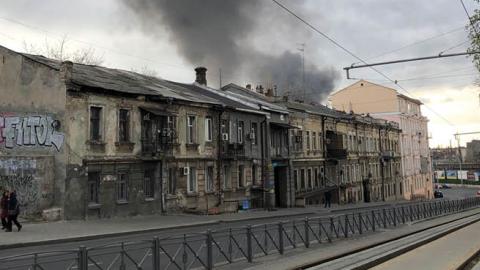 Smoke billows out from a damaged fuel depot in Odesa hours after a Russian missile strike on April 3. (James Barnett)