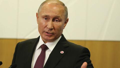 Russian President Vladimir Putin speaks during a press conference on November 15, 2018, in Singapore. (Getty Images)