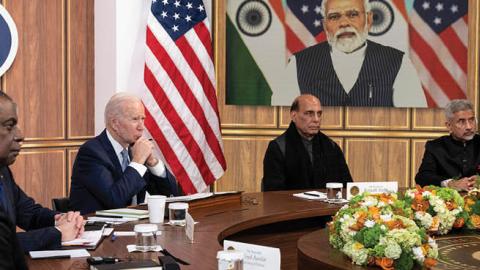 U.S. President Joe Biden, Indian Prime Minister Narendra Modi and their delegations hold a virtual meeting on April 11, 2022. (Photo by Drew Angerer/Getty Images)