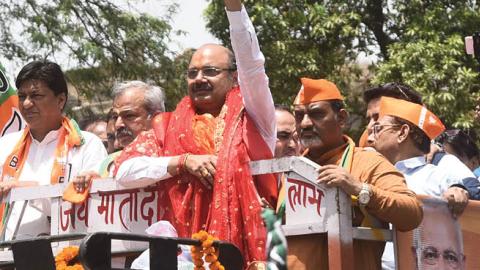 Delhi BJP President Adesh Gupta with BJP party candidate Rajesh Bhatia flash the victory sign on June 6, 2022 in New Delhi, India. (Photo by Sonu Mehta/Hindustan Times via Getty Images)