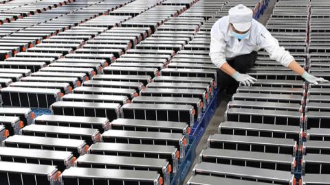 A worker at a lithium battery factory in Nanjing, China. (STR/Agence France-Presse/Getty Images)