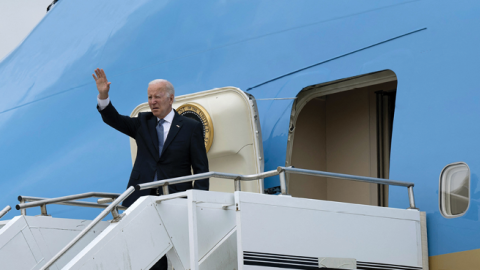 President Joe Biden waves before boarding Air Force One on June 28, 2022, in Munich, Germany, after attending the G7 Summit hosted by the German chancellor. (Photo by Brendan Smialowski / AFP via Getty Images)