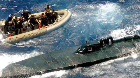 Law Enforcement Detachment 106 captures a cocaine-laden self-propelled semi-submersible in the eastern Pacific Ocean in 2009. (US Coast Guard)