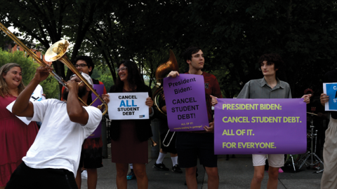 A brass band plays during a rally outside of the White House to call on Joe Biden to cancel student debt on July 27, 2022, in Washington, DC. (Anna Moneymaker/Getty Images)