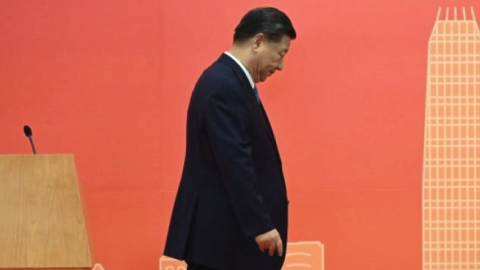 Xi Jinping leaves the podium in Hong Kong at a celebration of the twenty-fifth anniversary of the city's handover from Britain to China. (Selim Chtayti/AFP via Getty Images)