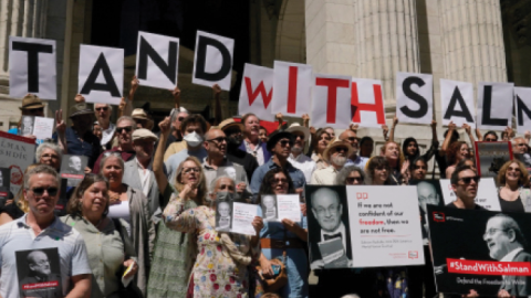 Writers gather to read selected works of author Salman Rushdie to show solidarity for free expression outside the New York Public Library in New York City on August 19, 2022. (Timothy A. Clary/AFP via Getty Images)