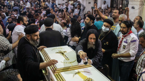 Mourners react during a funeral for victims killed in a fire at a Coptic church in Giza on August 14, 2022. (Mahmoud Elkhwas/NurPhoto via Getty Images)