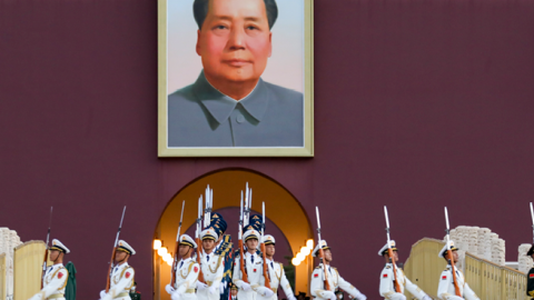 People's Liberation Army Honor Guard attend a flag-raising ceremony at the Tiananmen Square to mark the seventy-second anniversary of the founding of the People's Republic of China on October 1, 2021, in Beijing, China. (VCG via Getty Images)