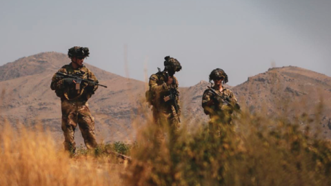 Soldiers assigned to the 82nd Airborne provide security during an evacuation at Hamid Karzai International Airport, Kabul, Afghanistan, on August 21, 2021. (Marine Corps photo by Sgt. Isaiah Campbell)