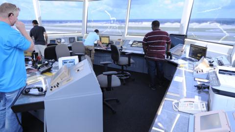 Air traffic controllers direct air and ground operations atop the new air traffic control tower June 11, 2013, at Pope Field, N.C. (Tech. Sgt. Peter R. Miller / U.S. Air Force)