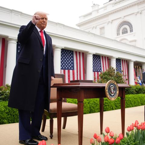 US President Donald Trump reacts after signing executive orders imposing tariffs on imported goods in the Rose Garden at the White House on April 2, 2025, in Washington, DC. (Andrew Harnik via Getty Images)