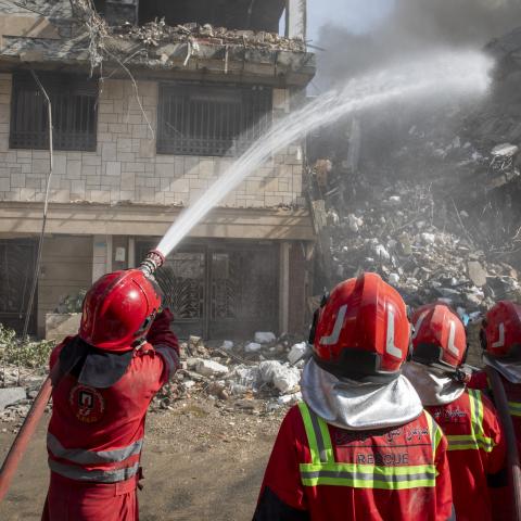 Firefighters extinguish a fire in a building that was destroyed in an Israeli attack on June 13, 2025, in Tehran, Iran. (Majid Saeedi via Getty Images)