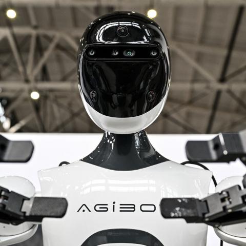 A robot from AgiBot is seen during the Global Developer Conference, organized by the Shanghai AI Industry Association, in Shanghai on February 21, 2025. (Hector Retamal via Getty Images)