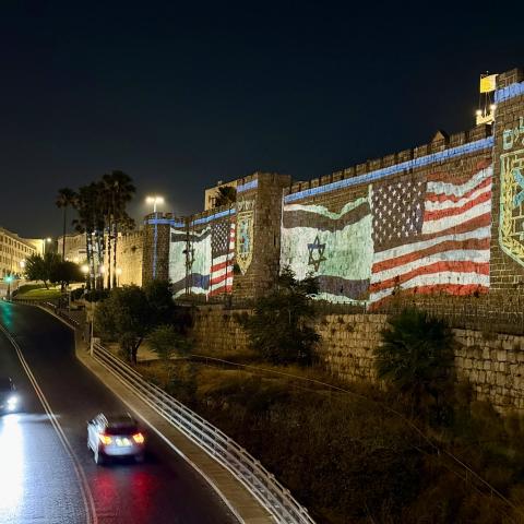 US and Israeli flags are projected on the historic walls of the Old City near Hebron Gate in Jerusalem after the United States carried out airstrikes on Iran’s nuclear sites on June 22, 2025. (Gazi Samad via Getty Images)