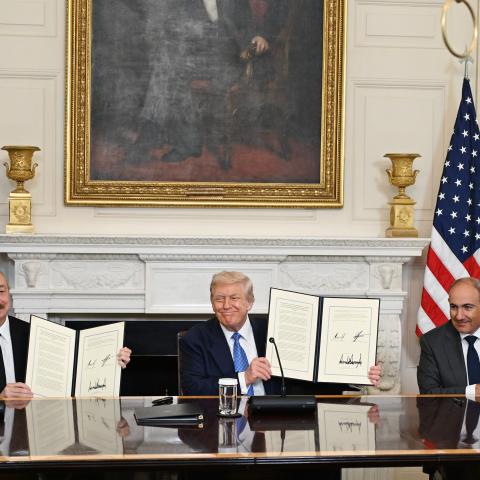 : President Donald Trump, Azerbaijani President Ilham Aliyev, and Armenian Prime Minister Nikol Pashinyan sign a joint declaration at the White House in Washington DC, on August 8, 2025. (Getty Images)