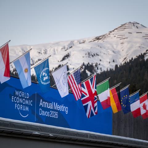  A sign of the World Economic Forum (WEF) is seen on the top of the Congress Centre that hosts the WEF annual meeting in the Alpine resort of Davos on its opening day in Davos on January 19, 2026. The World Economic Forum takes place in Davos from January 19 to January 23, 2026. (Photo by Fabrice COFFRINI / AFP via Getty Image