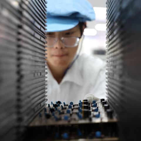 Caption A worker produces integrated circuit products in a workshop in Weihai, Shandong Province, China, on September 9, 2025. (Getty Images) Share to Twitter