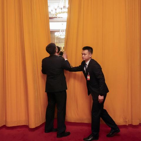 Officials close a curtain during a meeting between China's President Xi Jinping and US Secretary of State Antony Blinken in Beijing on April 26, 2024. (Getty Images)