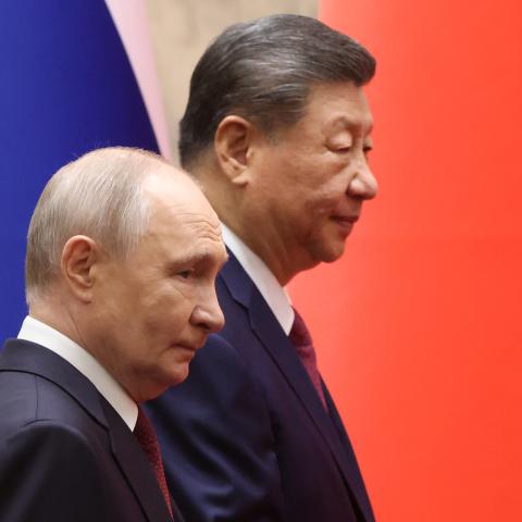 Russian President Vladimir Putin and Chinese President Xi Jinping enter the hall during a signing ceremony on May 20, 2026, in Beijing, China. (Getty Images)