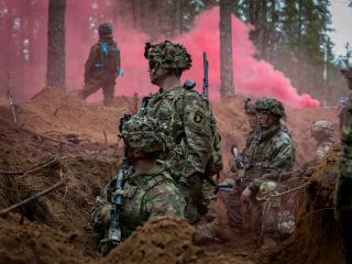 U.S. Army infantry Soldiers with Headquarters and Headquarters “Crusher” Company, 1st Battalion, 187th Infantry Regiment “Leader Rakkasans,” 3rd Brigade Combat Team, 101st Airborne Division (Air Assault), supporting 3rd Infantry Division, wait for further instruction during a force on force exercise near Tapa, Estonia, April 14, 2024.  (U.S. Army photo by Spc. Trey Gonzales)