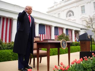 US President Donald Trump reacts after signing executive orders imposing tariffs on imported goods in the Rose Garden at the White House on April 2, 2025, in Washington, DC. (Andrew Harnik via Getty Images)