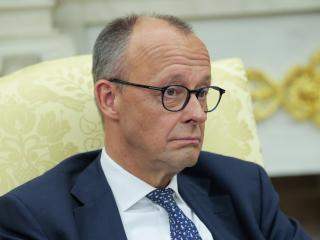 German Chancellor Friedrich Merz listens to a reporter's question during a meeting with US President Donald Trump in the Oval Office on June 05, 2025, in Washington, DC. (Anna Moneymaker via Getty Images)