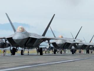 The U.S. Air Force 354th Air Expeditionary Wing and Marine Aircraft Group 12 performed a capabilities demonstration during a pre-planned readiness exercise at Marine Corps Air Station Iwakuni, Japan, July 7, 2022. The demonstration included U.S. Marine Corps F/A-18 Hornets, F-35B Lighting IIs, KC-130J Super Hercules aircraft, and U.S. Air Force F-22 Raptors and F-35A Lighting II aircraft, showcasing a high level of readiness and joint service capability in support of a free and open Indo-Pacific. (U.S. Mari