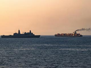 y U.S. Central Command, U.S. forces patrol the Arabian Sea near M/V Touska on April 20, 2026, after firing upon the Iranian-flagged vessel that the U.S. accused of attempting to violate the U.S. naval blockade of Iranian ports near the Strait of Hormuz. (Handout Photo by the U.S. Navy via Getty Images)