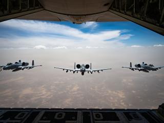 Three U.S. Air Force A-10C Thunderbolt II aircraft fly in formation after aerial refueling from an HC-130J Combat King II aircraft in the U.S. Central Command area of responsibility, May 9, 2026. (U.S. Air Force photo)