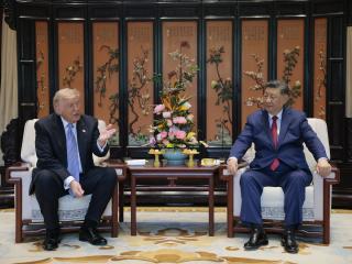 President Donald Trump and Chinese President Xi Jinping meet on the sidelines of a visit to Zhongnanhai Garden on May 15, 2026 in Beijing, China. Trump and other U.S. officials are finishing up a visit intended to address the Iran conflict, trade imbalances, and the Taiwan situation while establishing new bilateral boards for economic and AI oversight. (Photo by Evan Vucci-Pool/Getty Images)