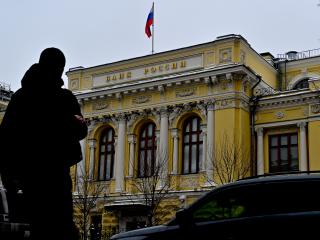 A man walks near the headquarters of the Russian Central Bank in Moscow on February 13, 2026. (Getty Images)