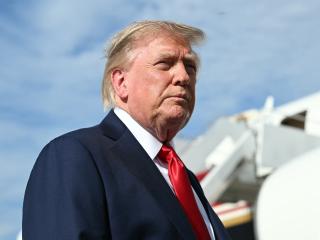 President Donald Trump speaks to reporters before boarding Air Force One at Joint Base Andrews, Maryland, on August 21, 2026. (Getty Images)