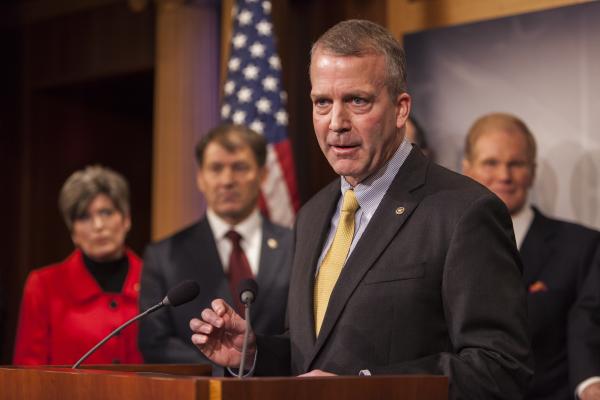  Senator Dan Sullivan speaks during a news conference with members of the Senate Armed Services Committee about arming Ukraine in the fight against Russia in Washington, D.C. on February 5, 2015. (Photo by Samuel Corum/Anadolu Agency/Getty Images)