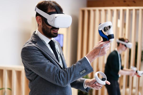 People use Meta Quest VR headset at the Meta showroom in Brussels, Belgium, on December 7, 2022. (Kenzo Tribouillard/AFP via Getty Images)