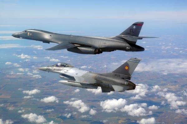 A Romanian F-16 escorts a B1B Lancer during a training mission for Bomber Task Force Europe on May 29, 2020. (Romanian Air Force photo)