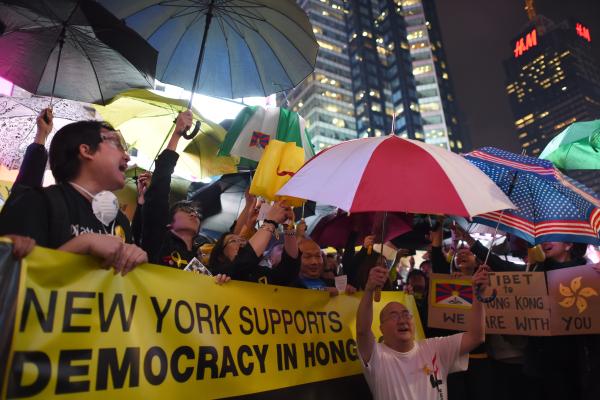 Hundreds gather in Times Square to rally in support of Hong Kong's "Umbrella Revolution" on October 1, 2014, in New York. (Don Emmert/AFP via Getty Images)