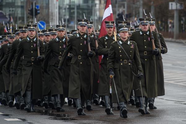 Latvian soldiers march during a military parade on Armed Forces Day 2023 in Vilnius. (Photo by Yauhen Yerchak/SOPA Images/LightRocket via Getty Images)