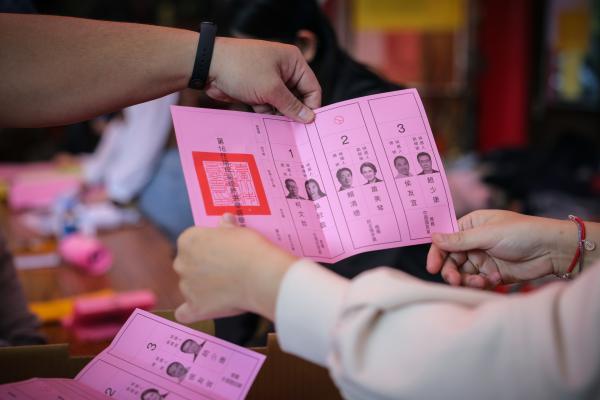 Election workers count ballots on January 13, 2024, in Taipei, Taiwan. (Photo by Annabelle Chih/Getty Images)