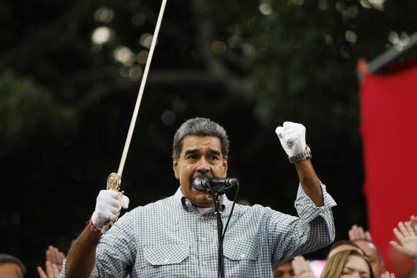 Venezuelan President Nicolas Maduro delivers a speech as he holds a replica of Liberator Simon Bolivar's sword during a rally in Caracas on August 28, 2024. (Pedro Rances Mattey/AFP via Getty Images)