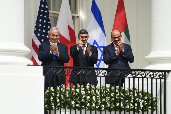 WASHINGTON, DC - SEPTEMBER 15: (L-R) Prime Minister of Israel Benjamin Netanyahu, Foreign Affairs Minister of the United Arab Emirates Abdullah bin Zayed Al Nahyan, and Foreign Affairs Minister of Bahrain Abdullatif bin Rashid Al Zayani attend the signing ceremony of the Abraham Accords, at the White House on September 15, 2020 in Washington, DC. (Photo by Chen Mengtong/China News Service via Getty Images)