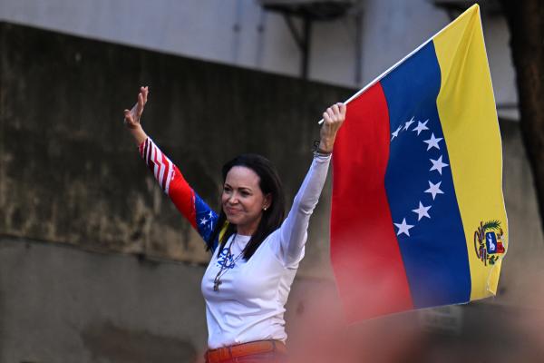 Venezuelan opposition leader Maria Corina Machado waves a national flag during an opposition protest  on January 9, 2025, in Caracas, Venezuela. (Getty Images)