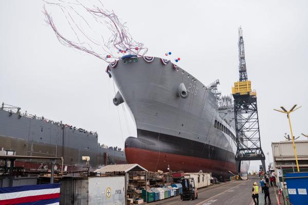 USNS Harvey Milk departs the General Dynamics NASSCO shipyard after a ceremonial address in San Diego, California on November 6, 2021. (AFP via Getty Images)