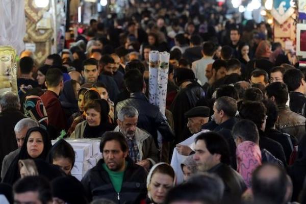 Iranians shop in Tehran's ancient Grand Bazaar on January 16, 2016. (ATTA KENARE/AFP/Getty Images)