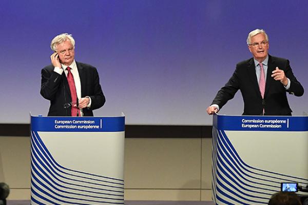 Brexit Minister David Davis and European Commission member in charge of Brexit negotiations Michel Barnier address a press conference in Brussels on June 19, 2017 (EMMANUEL DUNAND/AFP/Getty Images)