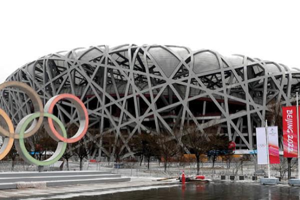 An Olympic Games logo is seen in front of Beijing's National Stadium, also known as the Bird's Nest, on January 20, 2022, in Beijing, China. (Getty Images)